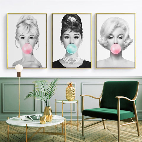 audrey-hepburn-with-a-pink-bubble-gum-canvas-print