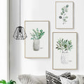 Green Plant In White Vase Canvas Print