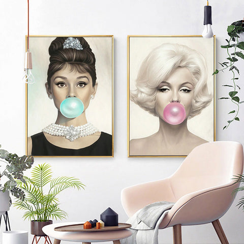 audrey-hepburn-with-a-pink-bubble-gum-canvas-print